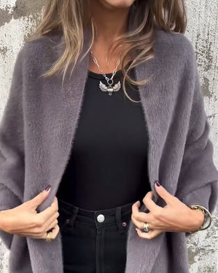 Pelsfrakke med frynser