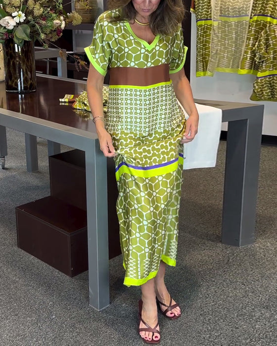 Lang kjole med V-udskæring og kontrastprint