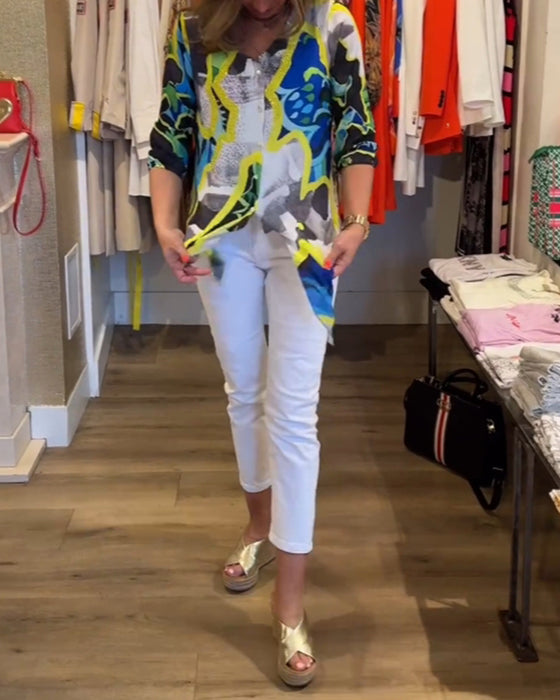 Bluse med V-udskæring og gule accenter