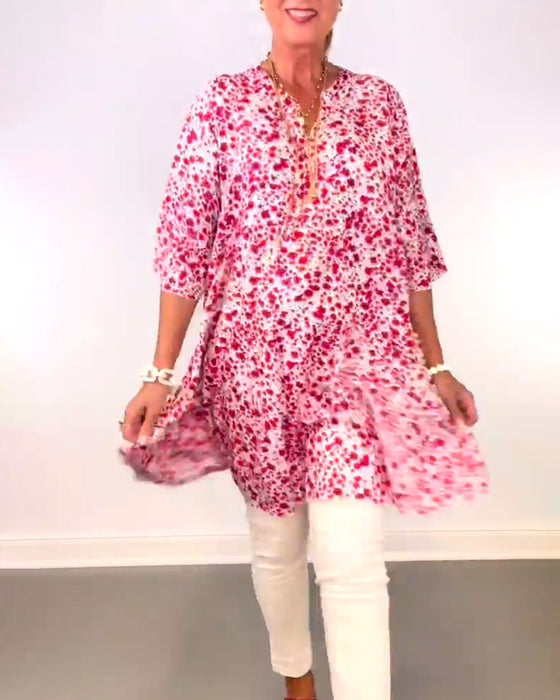 Lang blomsterbluse i løs pasform