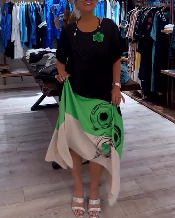 Løs patchworkkjole med rund hals