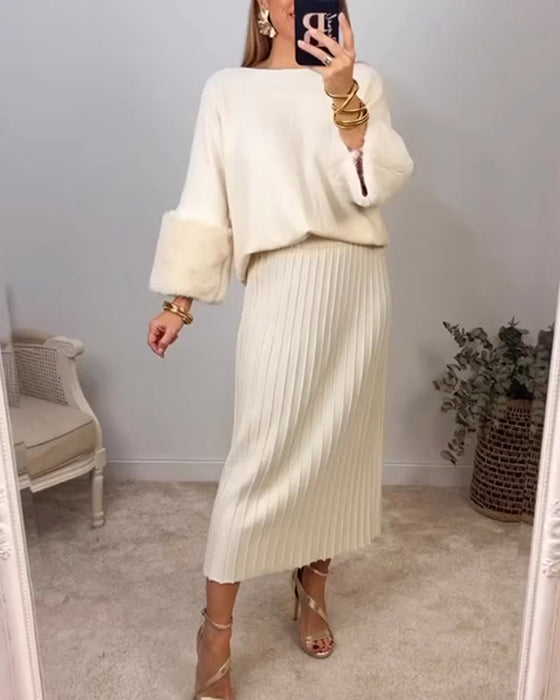 Elegant hvid sweater med plysmanchetter