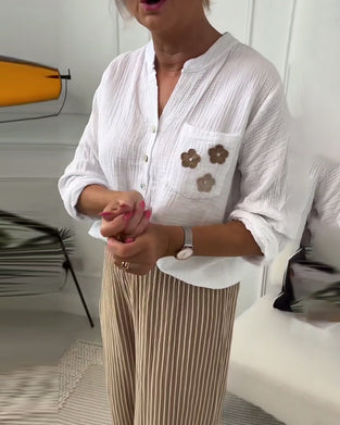 Afslappet langærmet bluse med brystlomme