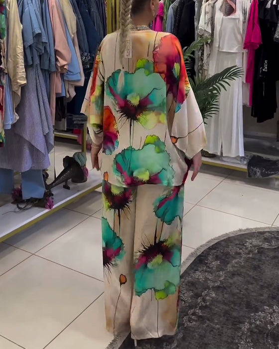 Buksedragt med lotusblomst print