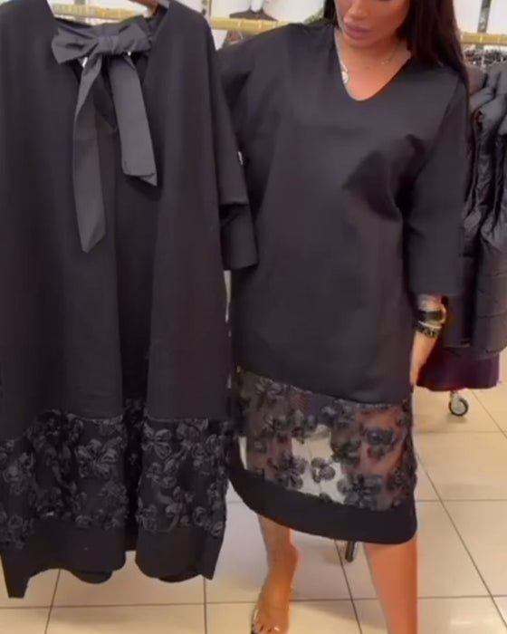 Stilfuld Kjole Med Sløjfe På Bagsiden Og V-Hals