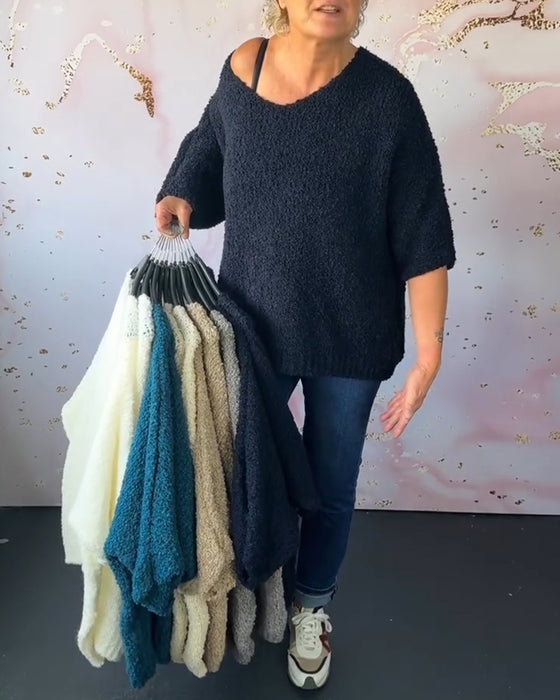 Ensfarvet sweater i løs pasform
