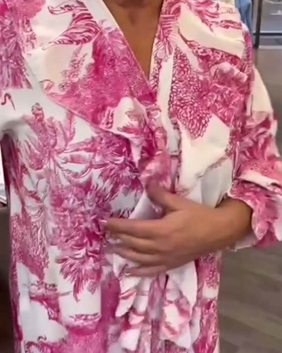 Afslappet bluse med flæser og print