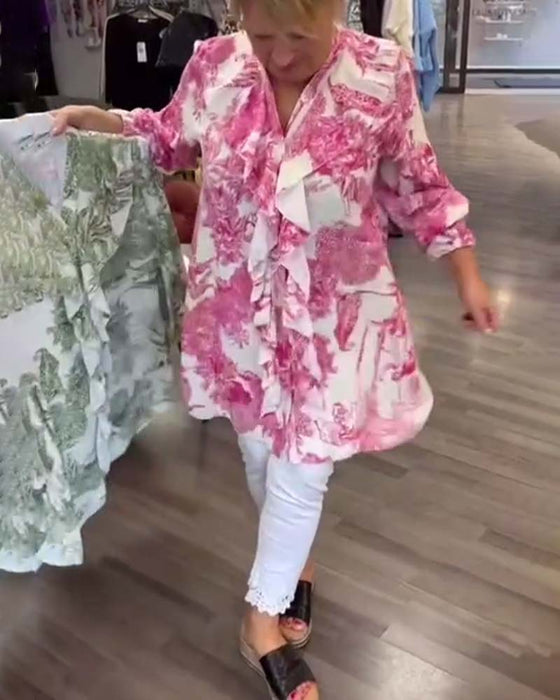 Afslappet bluse med flæser og print