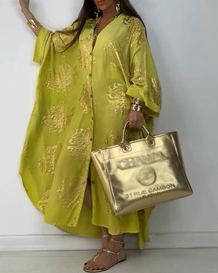 Langærmet oversized kjole med knapper og print