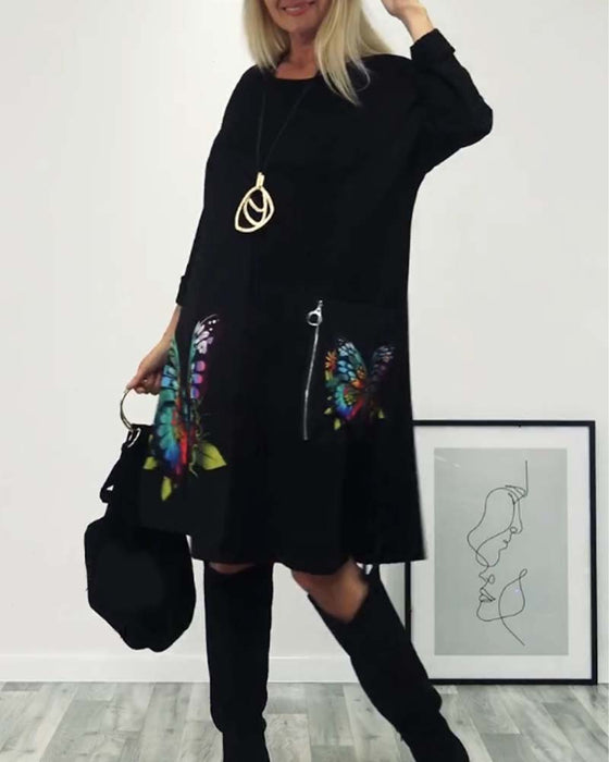 Sort kjole med sommerfugleprint