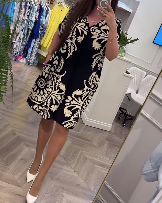 Knælang kjole med retro print