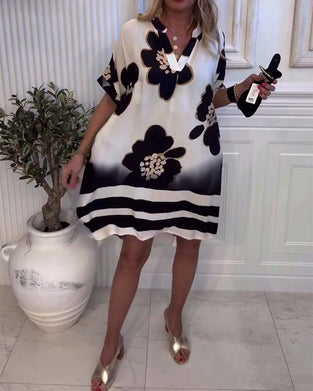 Kjole med stående krave og tryk