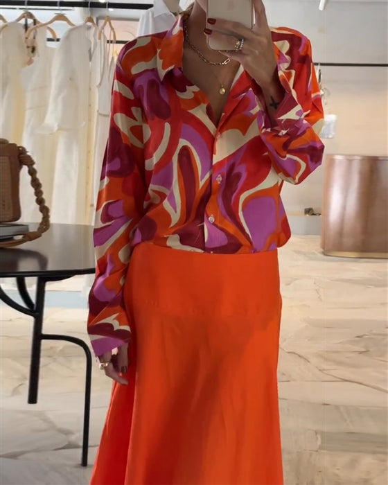 Farverig trykt bluse med revers og knapper