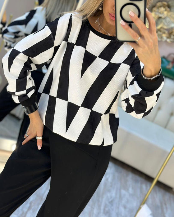 Sort/hvid sweatshirt med rund hals