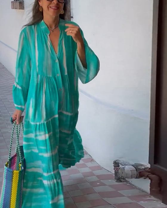 Afslappet løs lang kjole med V-udskæring og vide ærmer