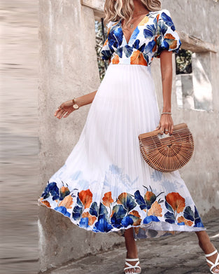 Kjole i dyb V-stil med bobleærmer