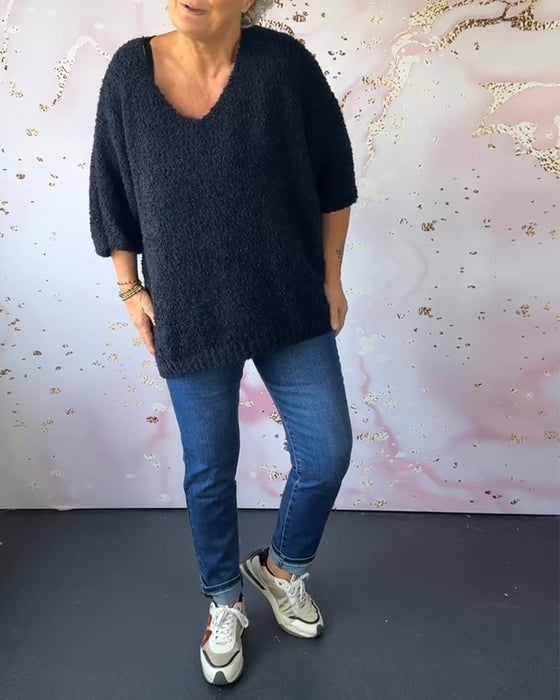 Ensfarvet sweater i løs pasform