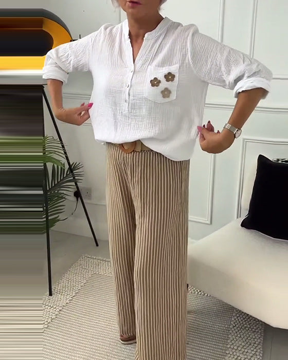 Afslappet langærmet bluse med brystlomme