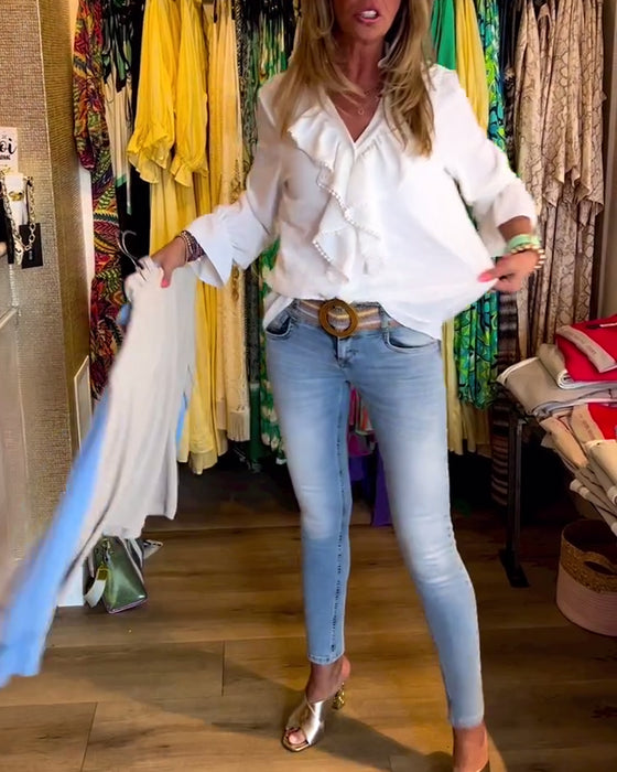 Hvid designerbluse med flæser