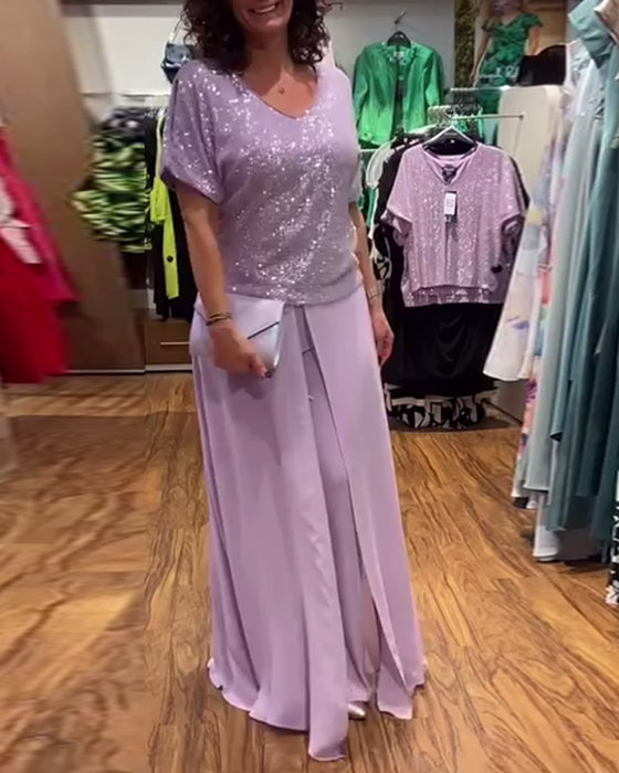 V-halset kortærmet bluse med pailletter