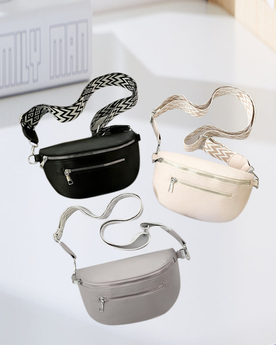 Skuldertaske med lynlås og mønstrede stropper