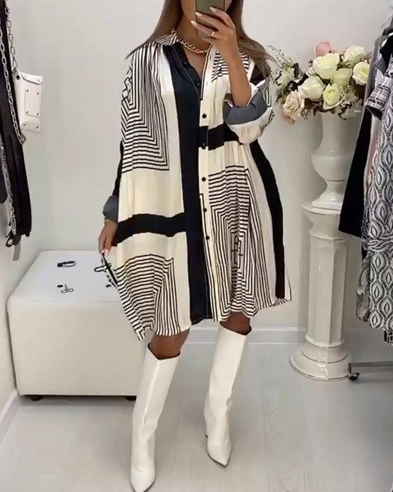 Oversized kjole med knapper og print