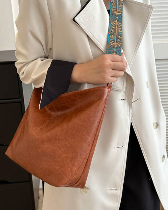 Vintage bucket bag med stor kapacitet og skulderstrop