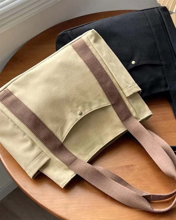 Kanvastaske med dobbelte hanke og stor kapacitet