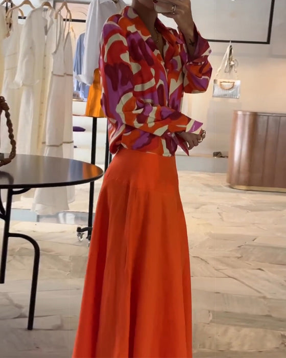 Farverig trykt bluse med revers og knapper