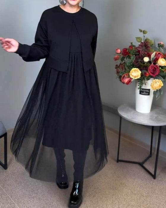 Elegant kjole med gennemsigtigt yderlag