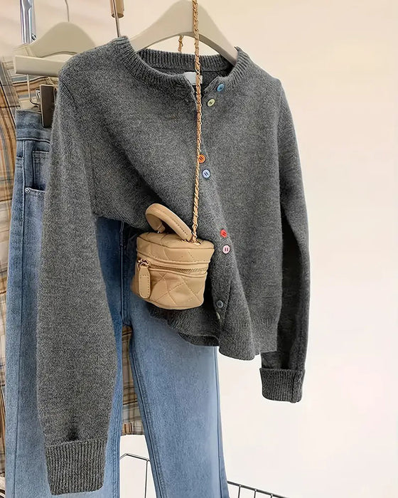 Cardigan i afslappet ensfarvet med lange ærmer