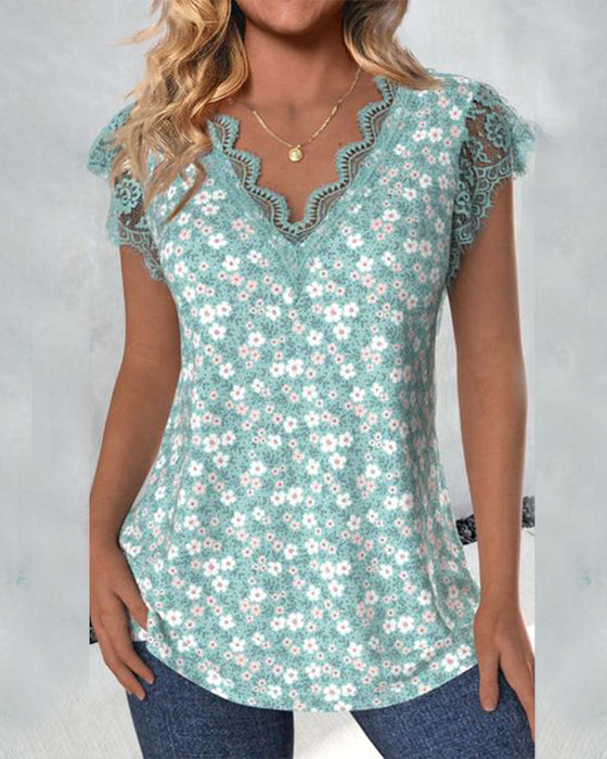 Bluse med blondekrave og print