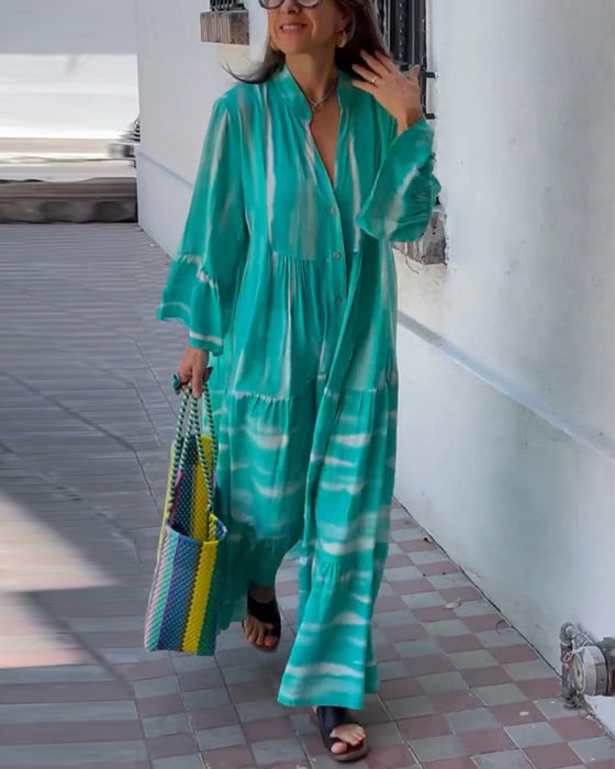 Afslappet løs lang kjole med V-udskæring og vide ærmer