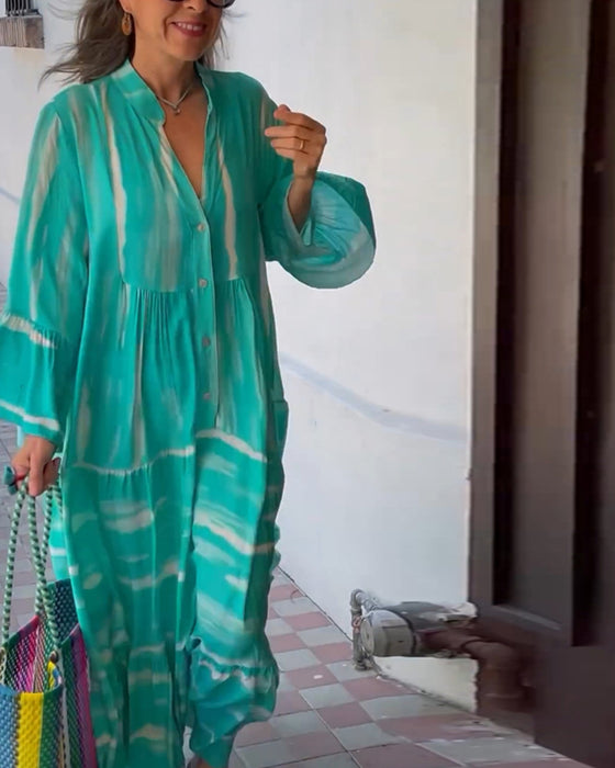 Afslappet løs lang kjole med V-udskæring og vide ærmer