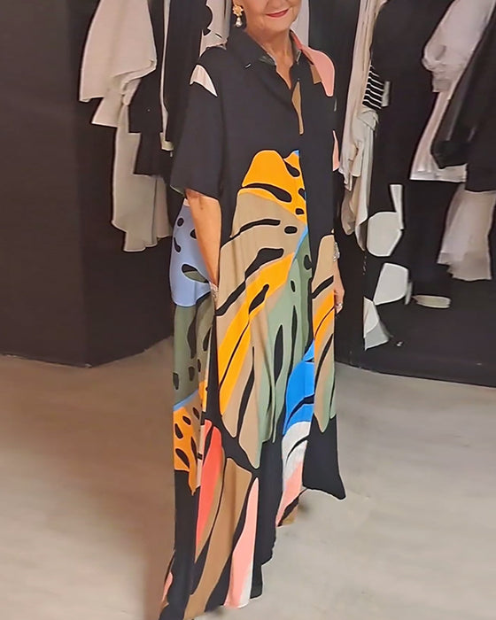 Lang kjole med stort bladmotiv