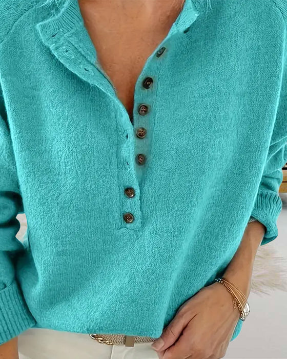 Frisk turkisfarvet sweater med henley-krave