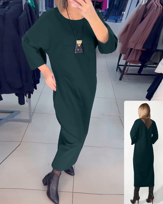 Maxikjole med lange ærmer og lommer