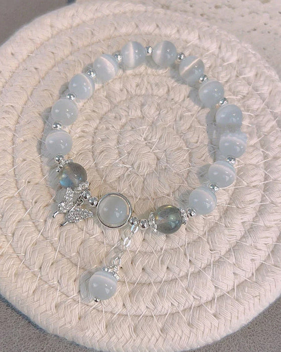 Imiteret katteøje krystalsommerfugle armbånd