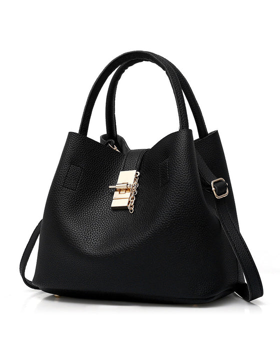 Stilfuld skuldertaske eller bucket bag