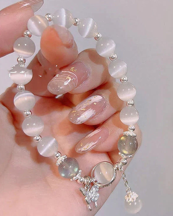 Imiteret katteøje krystalsommerfugle armbånd