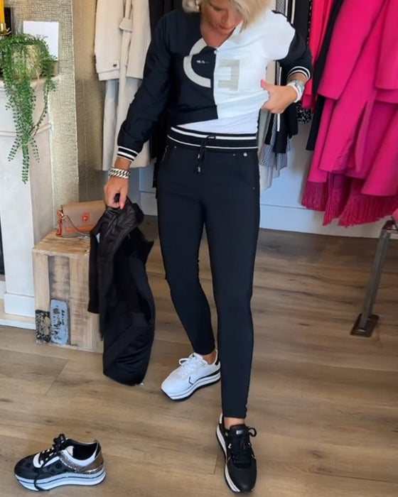 Top med V-udskæring og sort-hvid farveblok