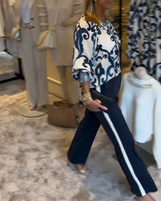 Bluse med lanterneærmer og retromønster