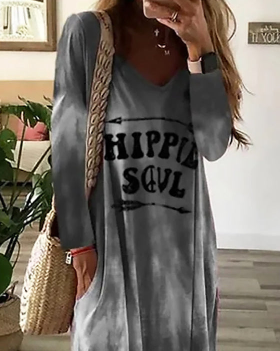 V-halset kjole med lomme og sidesnit