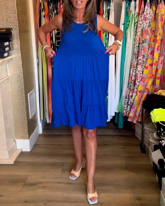 Blå ærmeløs kjole med plisseret nederdel