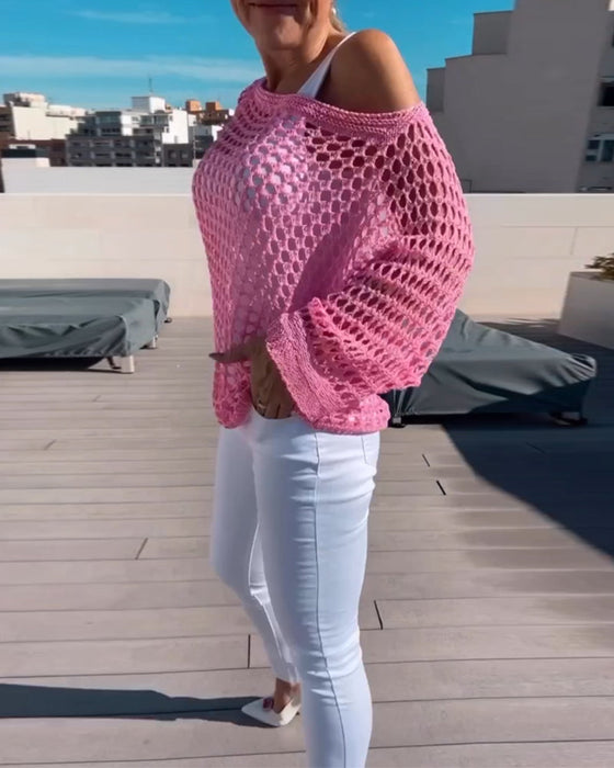 Ensfarvet top i udhulet netdesign