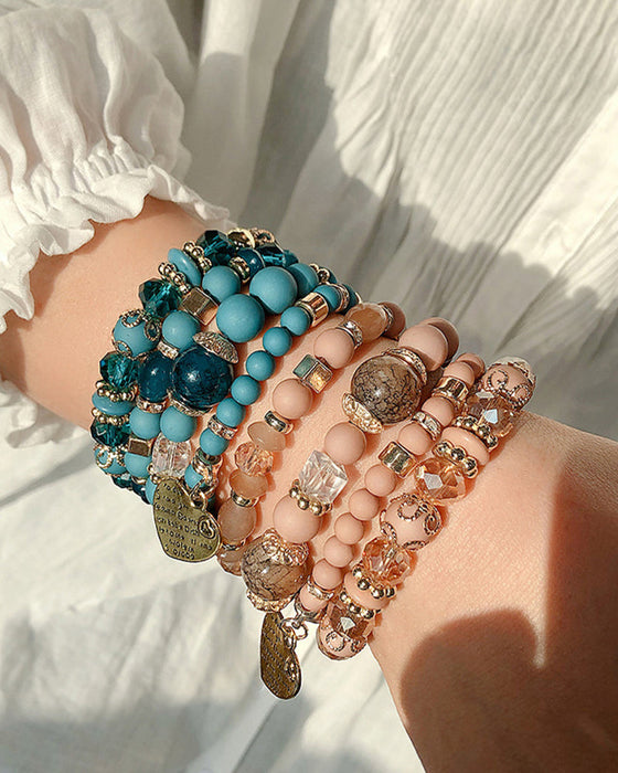 Lagdelt hjerteperlearmbånd