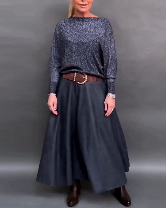 Skinnende top med rund hals og dolmanærmer