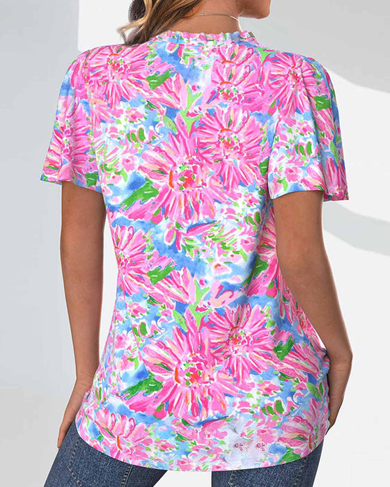 Lyserød bluse med tusindfryd