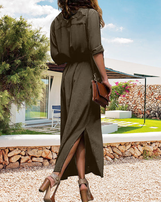 Ensfarvet langærmet kjole med knap og bælte