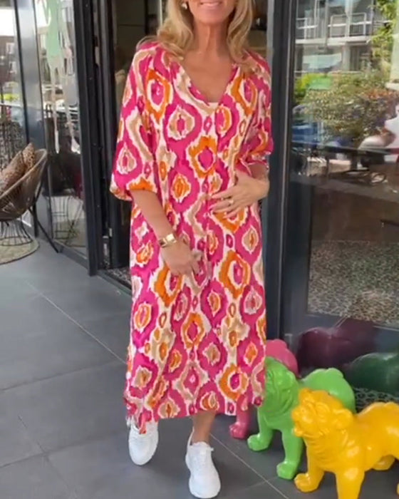 Stilfuldt mønstret sommerkjole med halve ærmer